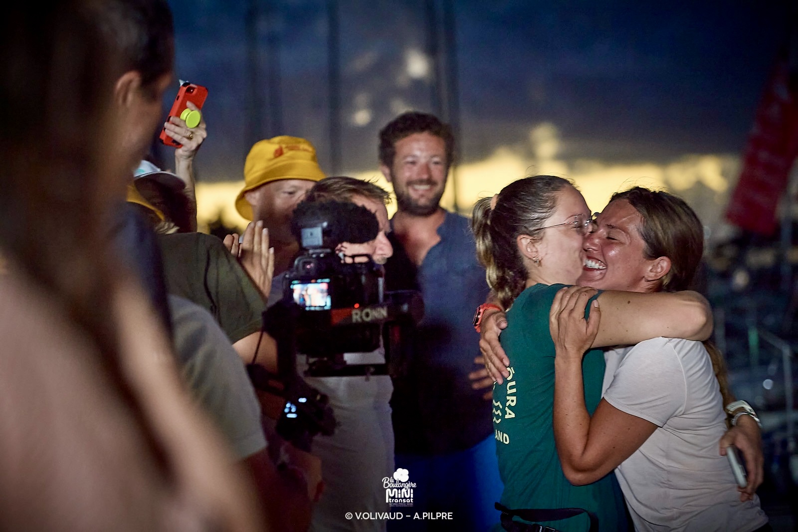 Ambre Hasson embracing a supporter at the finish of the Mini Transat